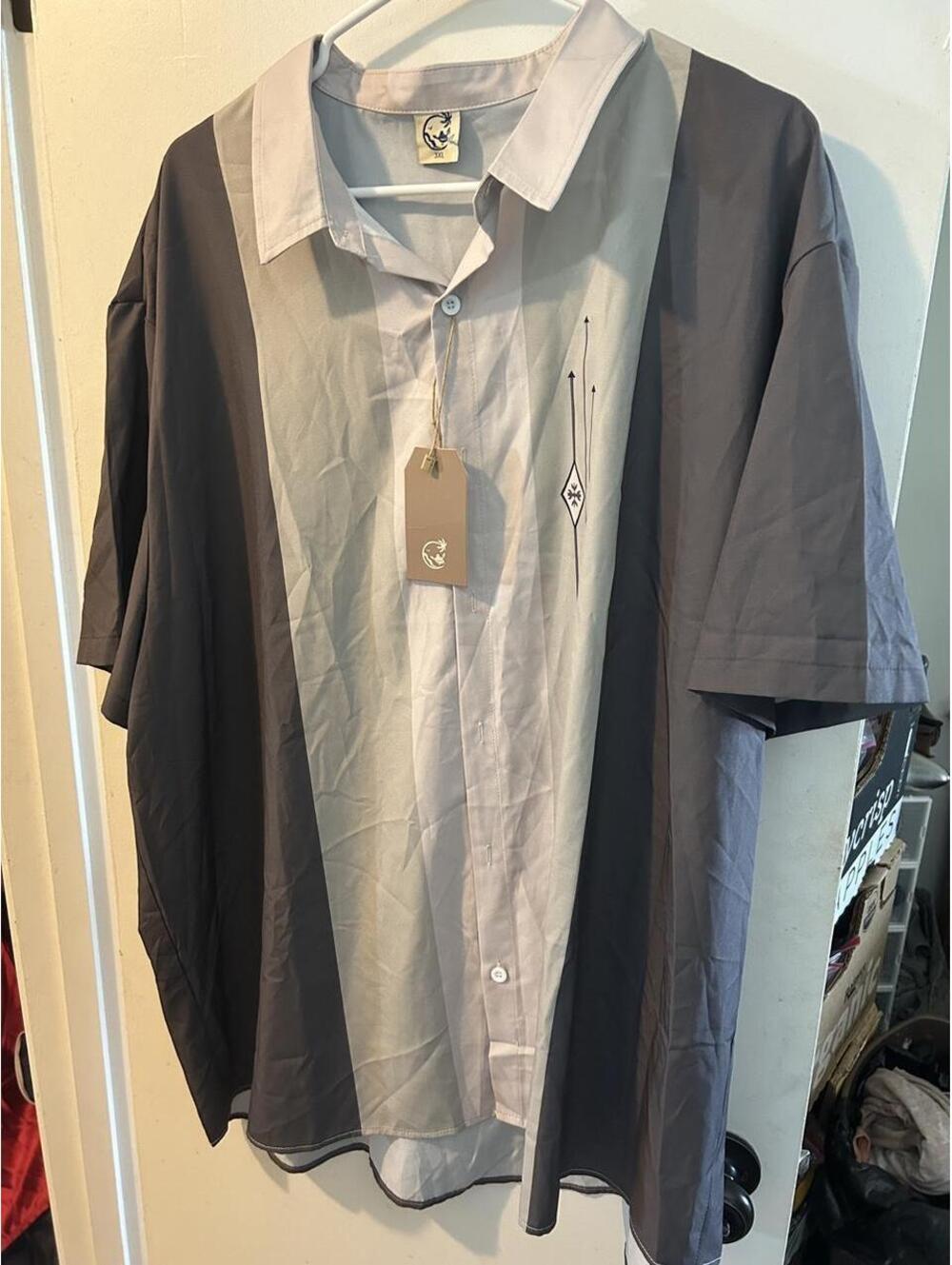 Aloha Flow with the Spirit shirt in gray and light gray with black geometric
